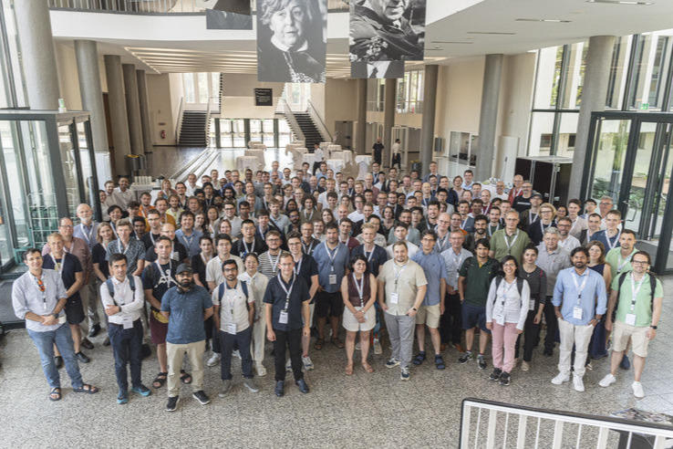 Forschende aus dem TRR 227 bei der Konferenz "Ultrafast Magnetism Conference 2024"