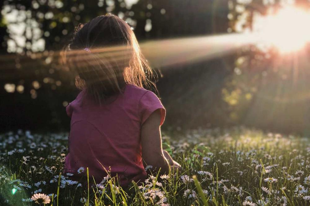Mädchen und Sonne